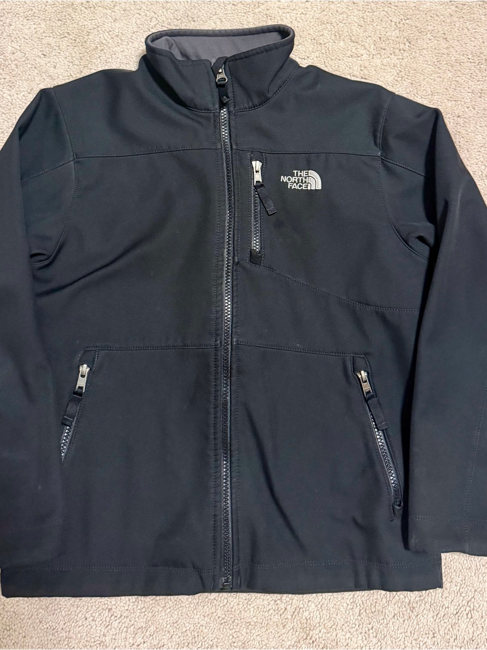 The North Face youth Black Softshell Jacket